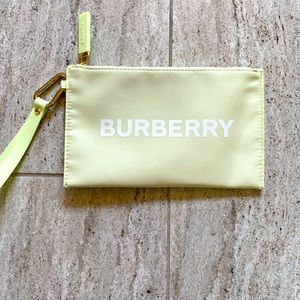 Lime green Burberry wristlet
